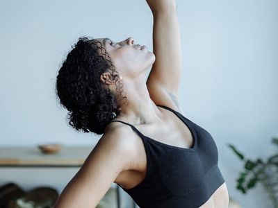 Close up of a yoga practitioner moving gracefully